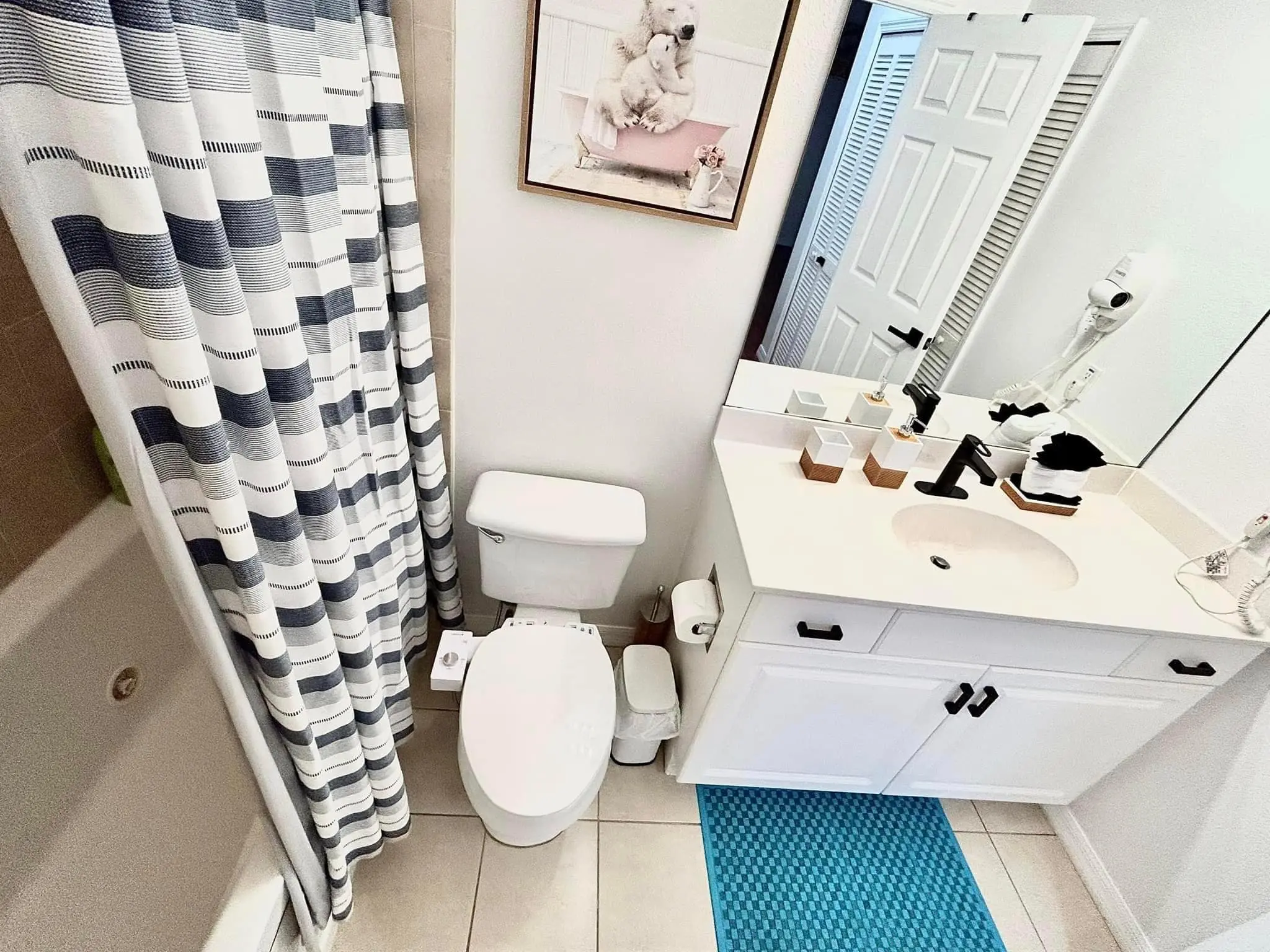 Guest bathroom staged and restocked for check in
